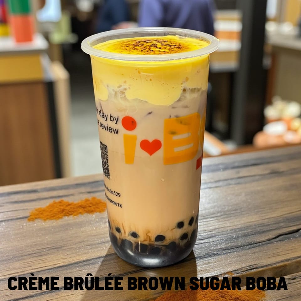 I HEART BOBA FM 529's Crème Brûlée Brown Sugar Boba with a caramelized topping on a wooden table.